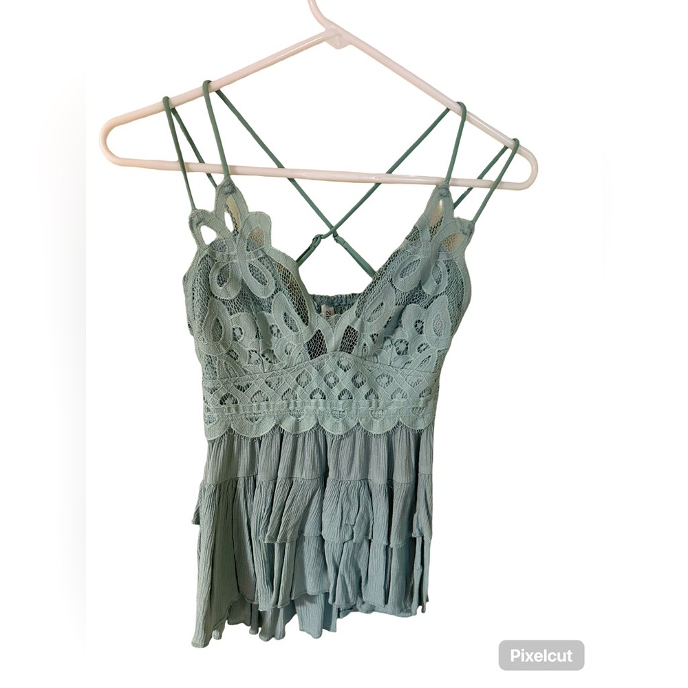 Strap tank top with lace top, pastel green color.